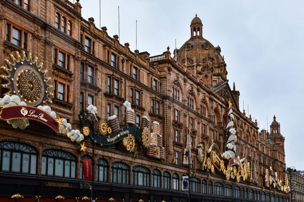 Harrods department store in London adorned with festive holiday decorations.