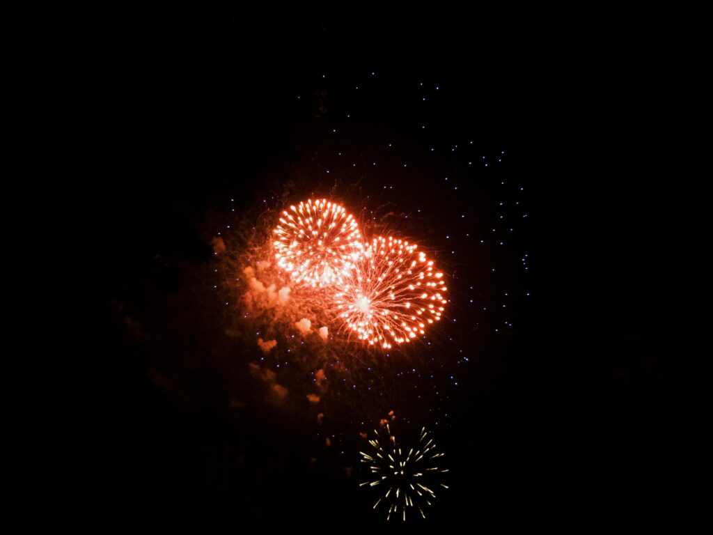 Vibrant fireworks illuminate Brazil's night sky in a dazzling nighttime celebration.